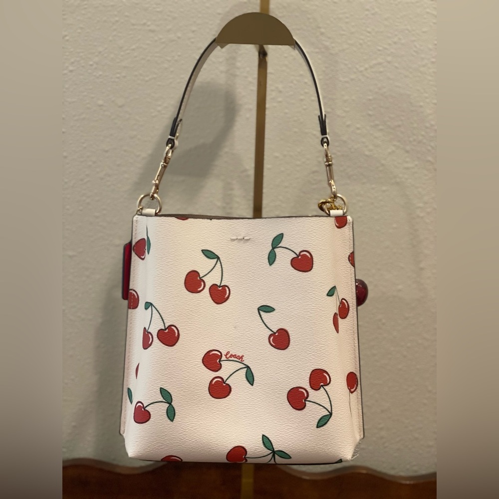 Coach White Cherry Print Crossbody Bag with Red Accents - Picture 3 of 16